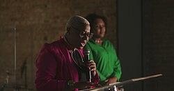 black woman preaching